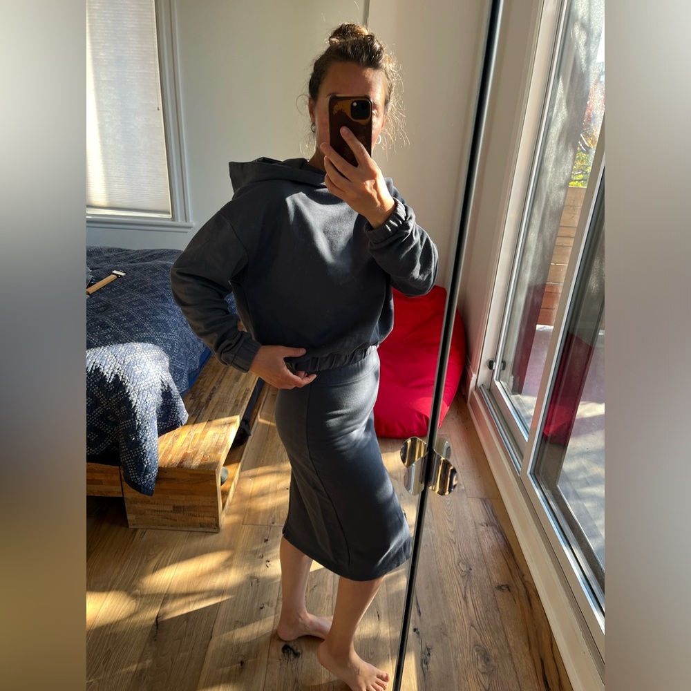 Louve design sweater and skirt